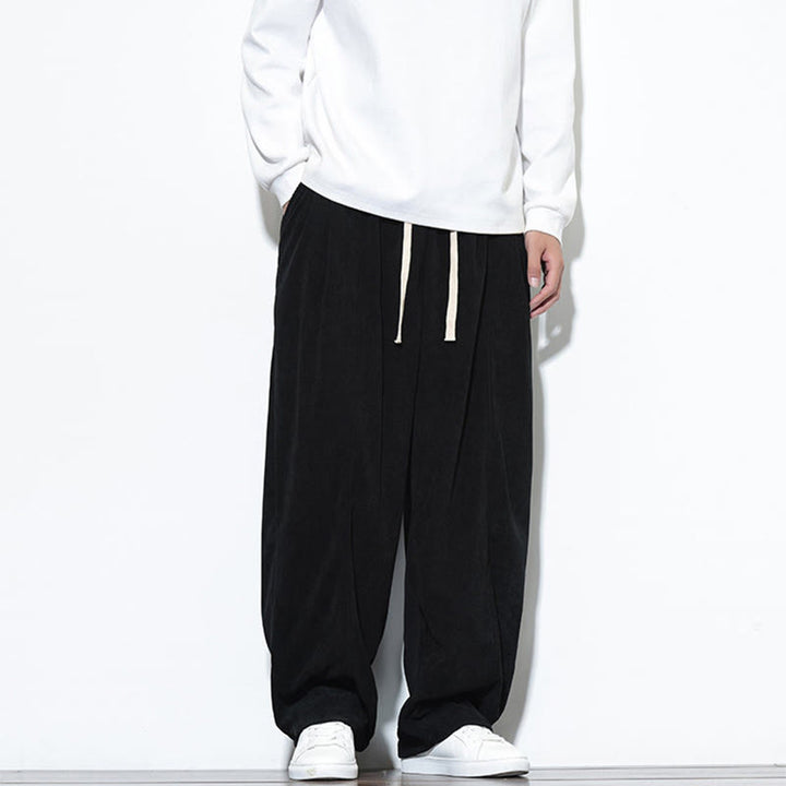 Pantaloni harem da uomo in puro velluto a coste con coulisse e tasche, con motivo Buddha Stones. - image 30