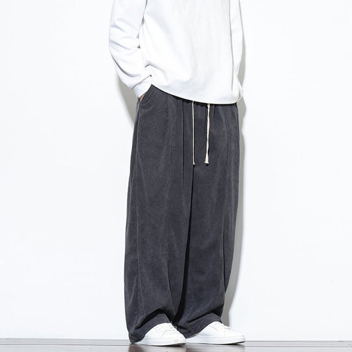 Pantaloni harem da uomo in puro velluto a coste con coulisse e tasche, con motivo Buddha Stones. - image 18