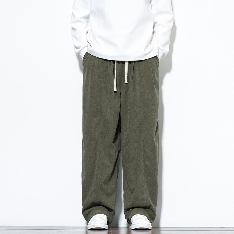 Pantaloni harem da uomo in puro velluto a coste con coulisse e tasche, con motivo Buddha Stones. - image 1