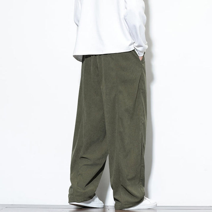 Pantaloni harem da uomo in puro velluto a coste con coulisse e tasche, con motivo Buddha Stones. - image 6