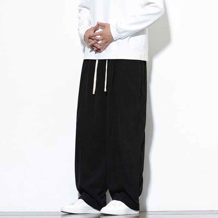 Pantaloni harem da uomo in puro velluto a coste con coulisse e tasche, con motivo Buddha Stones. - image 29