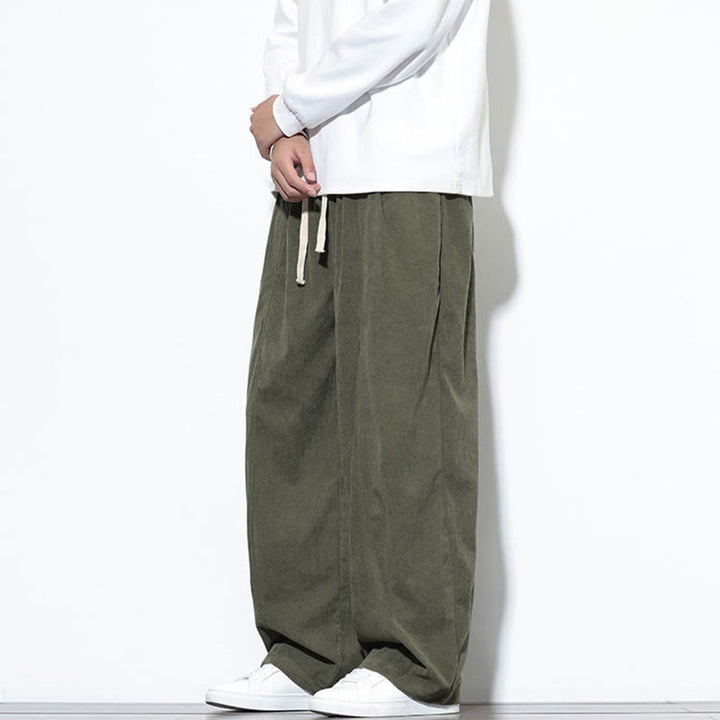 Pantaloni harem da uomo in puro velluto a coste con coulisse e tasche, con motivo Buddha Stones. - image 4