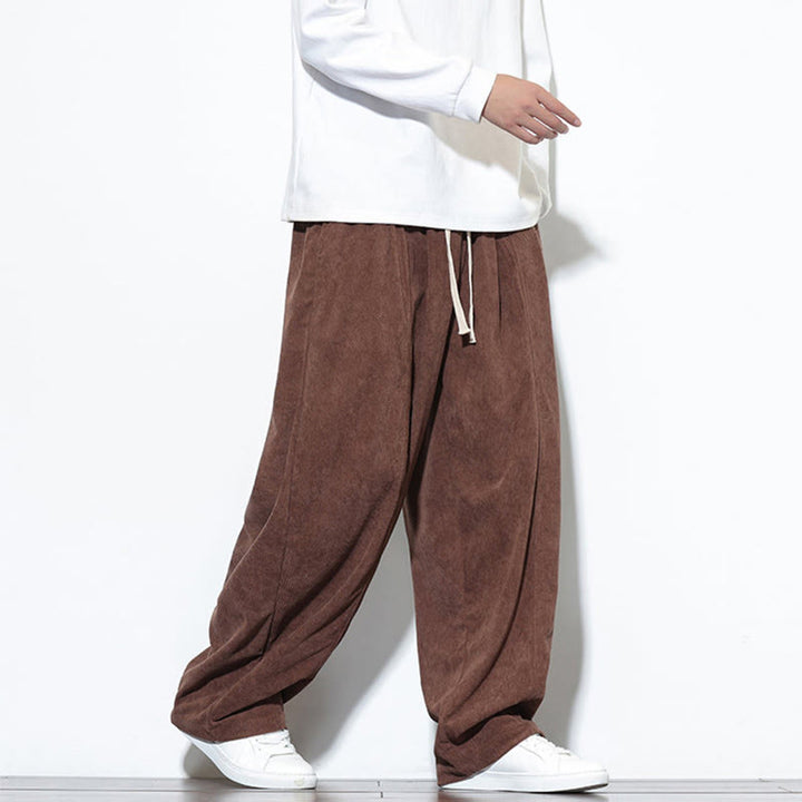 Pantaloni harem da uomo in puro velluto a coste con coulisse e tasche, con motivo Buddha Stones. - image 33