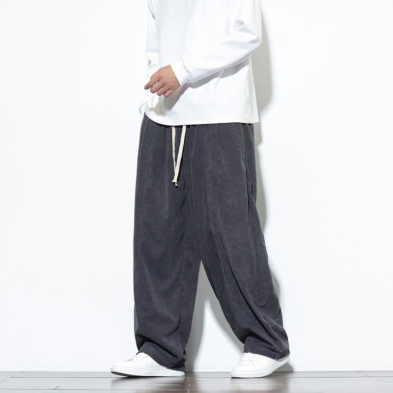 Pantaloni harem da uomo in puro velluto a coste con coulisse e tasche, con motivo Buddha Stones. - image 13