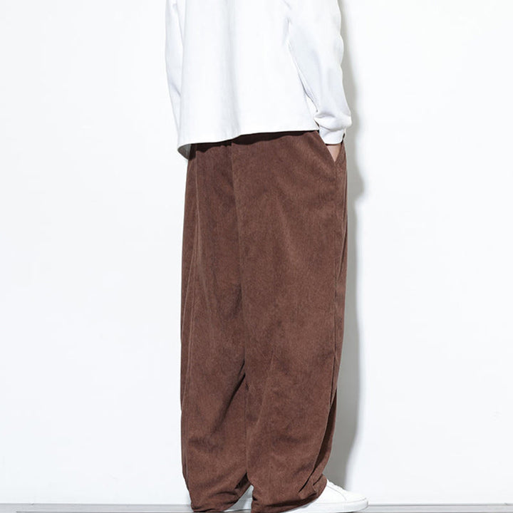 Pantaloni harem da uomo in puro velluto a coste con coulisse e tasche, con motivo Buddha Stones. - image 37