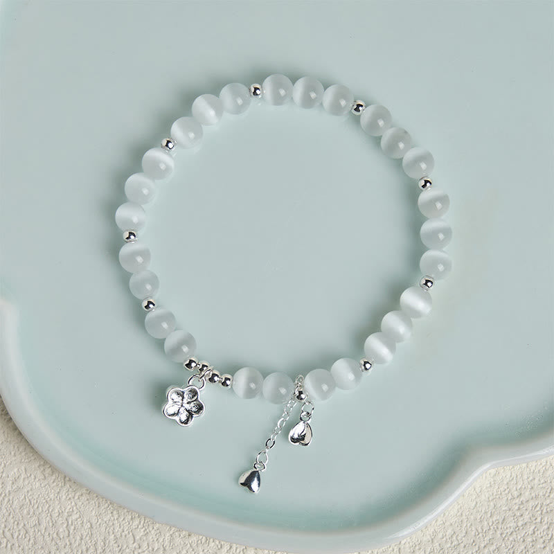 Bracciale della pace con fiori di ciliegio e occhio di gatto naturale Buddha Stones - image 3