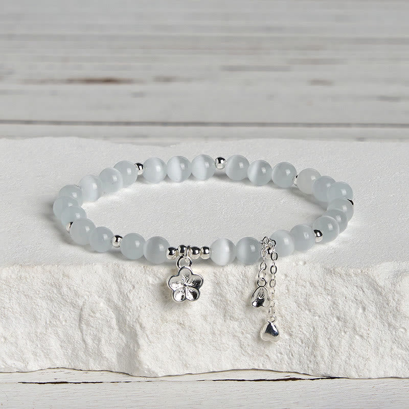 Bracciale della pace con fiori di ciliegio e occhio di gatto naturale Buddha Stones - image 2