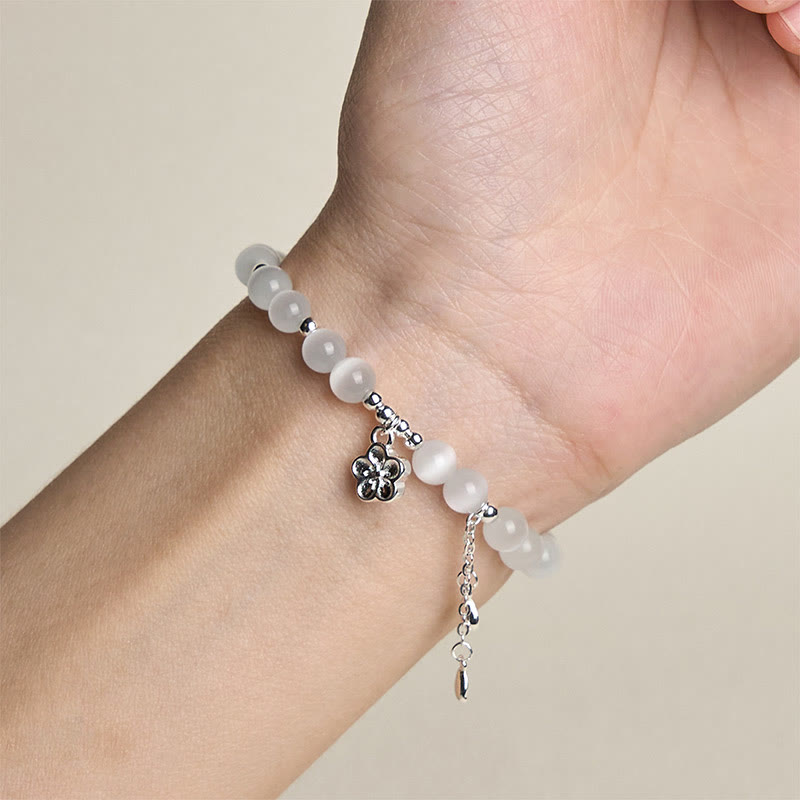 Bracciale della pace con fiori di ciliegio e occhio di gatto naturale Buddha Stones - image 4