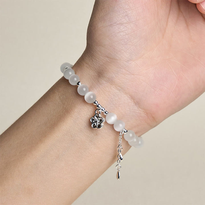 Bracciale della pace con fiori di ciliegio e occhio di gatto naturale Buddha Stones - image 4