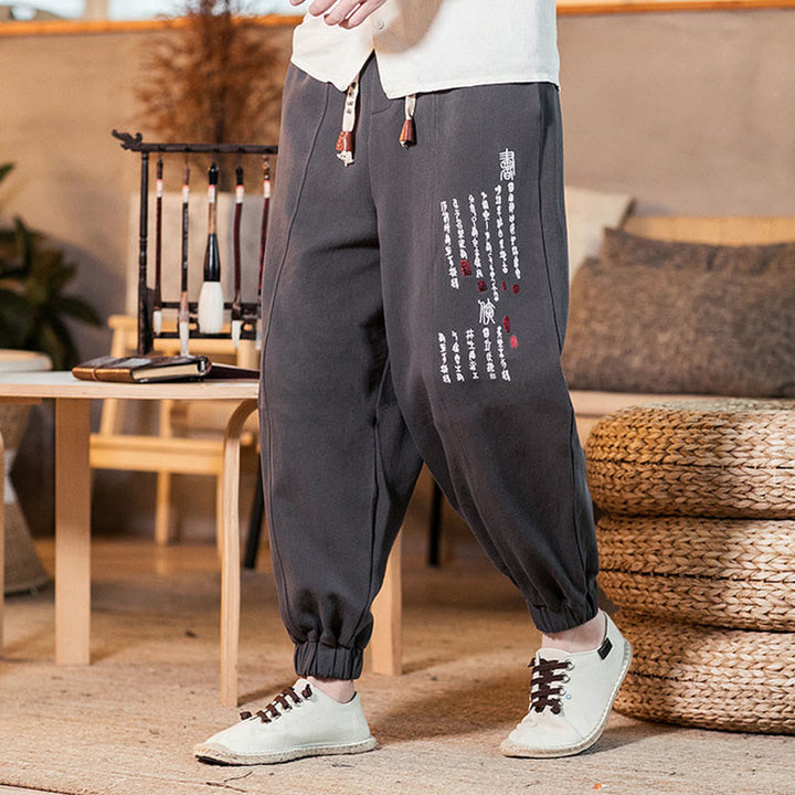 Pantaloni da uomo in cotone con tasche e motivo a caratteri cinesi ricamati con Buddha Stones - image 3