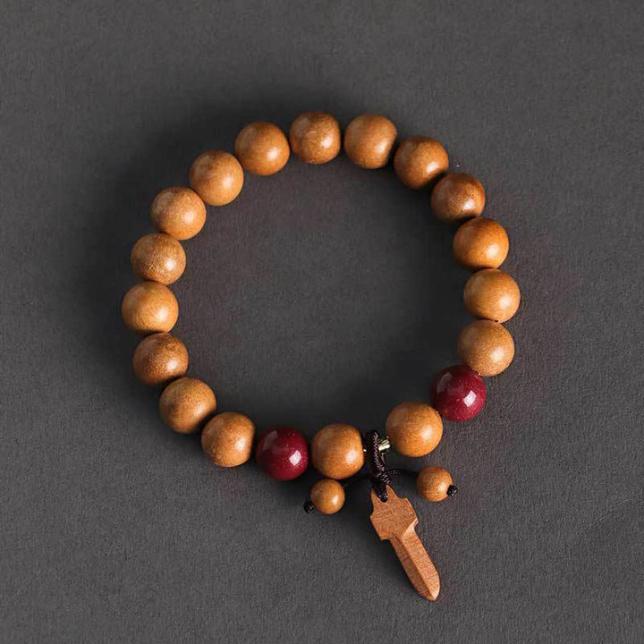 Braccialetto della ricchezza con ciondolo a forma di spada in legno di pesca e cinabro Buddha Stones - image 1