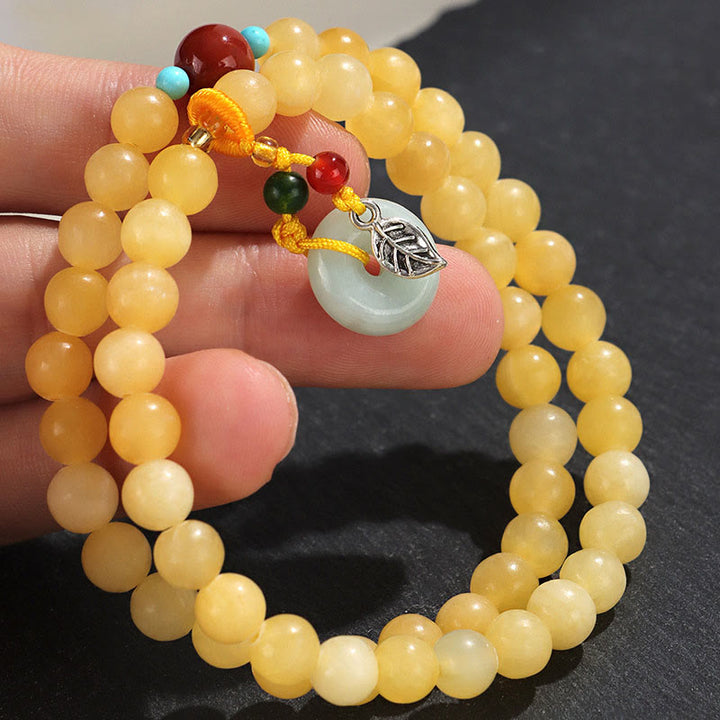 Bracciale della ricchezza con fibbia della pace a doppio giro in Buddha Stones e topazio - image 5