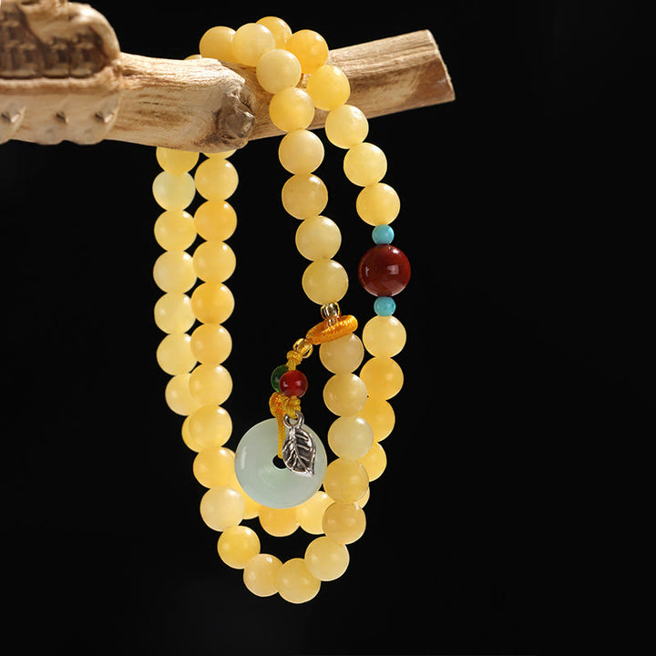 Bracciale della ricchezza con fibbia della pace a doppio giro in Buddha Stones e topazio - image 6