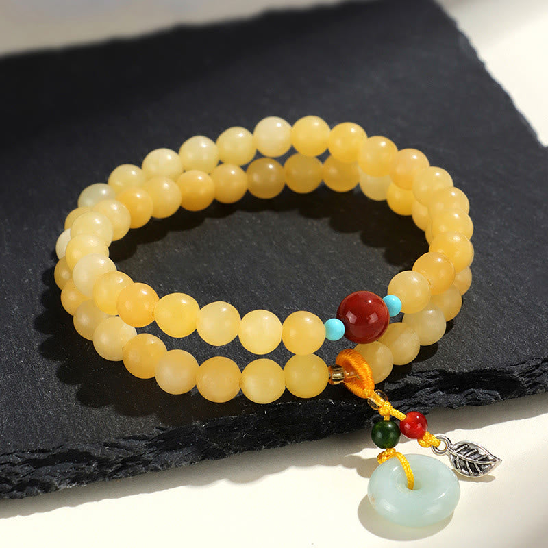 Bracciale della ricchezza con fibbia della pace a doppio giro in Buddha Stones e topazio - image 3