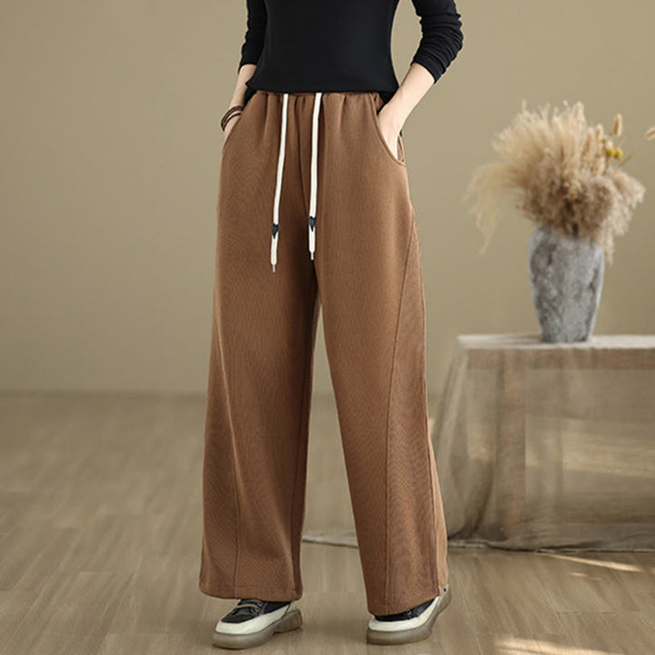 Pantaloni larghi da donna con coulisse e tasche, tinta unita, motivo Buddha Stones - image 1