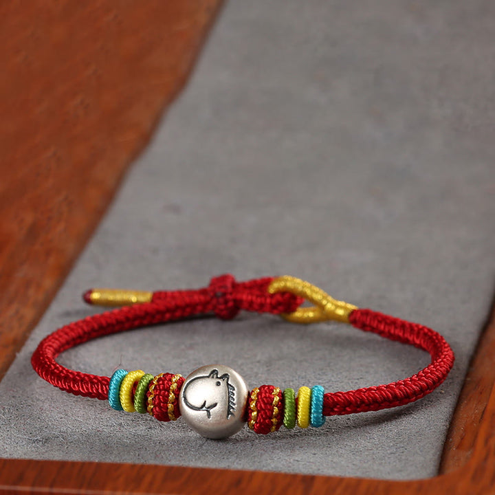 Bracciale della fede intrecciato con corda rossa in argento sterling 999 "Buddha Stones Year of the Horse" - image 2