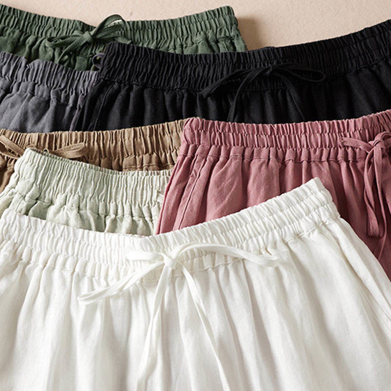 Pantaloni harem estivi con piccole decorazioni floreali e tasche, ispirati a Buddha Stones. - image 2