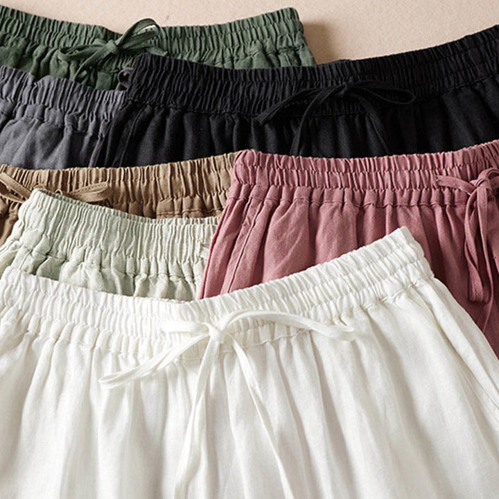 Pantaloni harem estivi con piccole decorazioni floreali e tasche, ispirati a Buddha Stones. - image 2