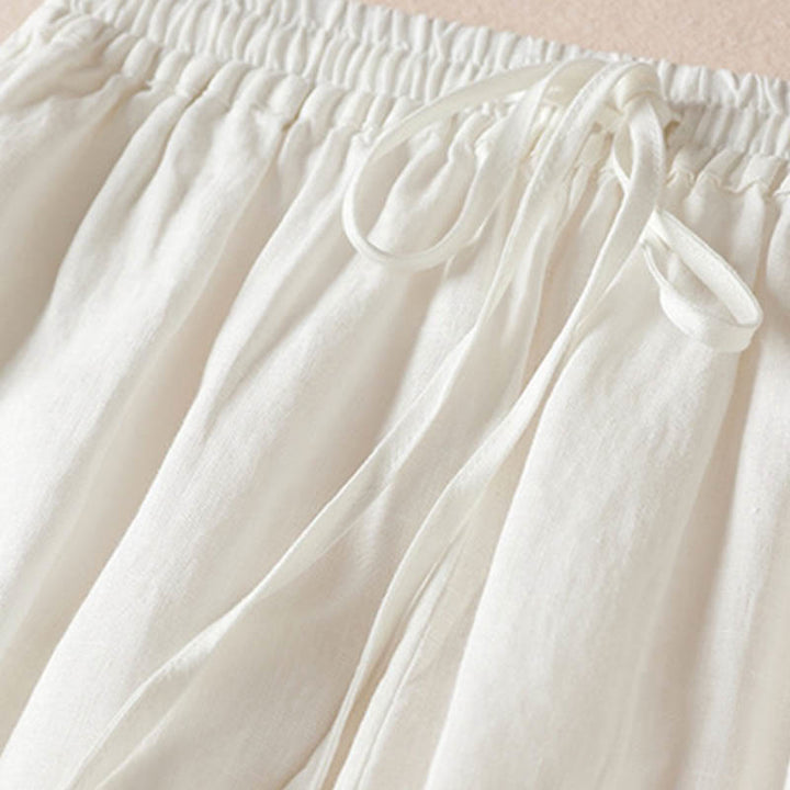 Pantaloni harem estivi con piccole decorazioni floreali e tasche, ispirati a Buddha Stones. - image 21