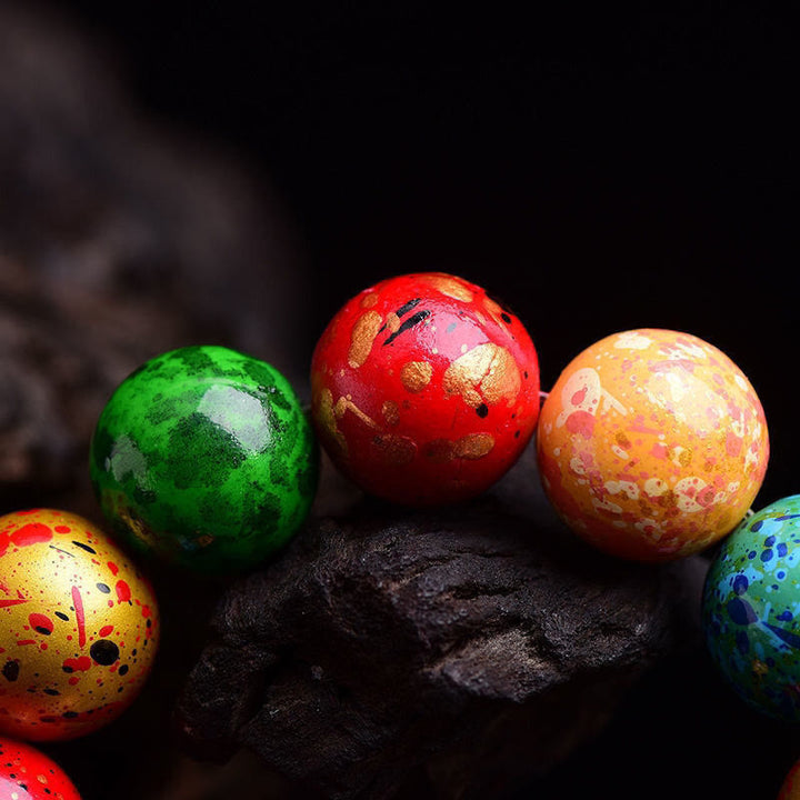 Braccialetto di protezione con perline in legno di sandalo lavorato a mano con Buddha Stones multicolore e lacca - image 3