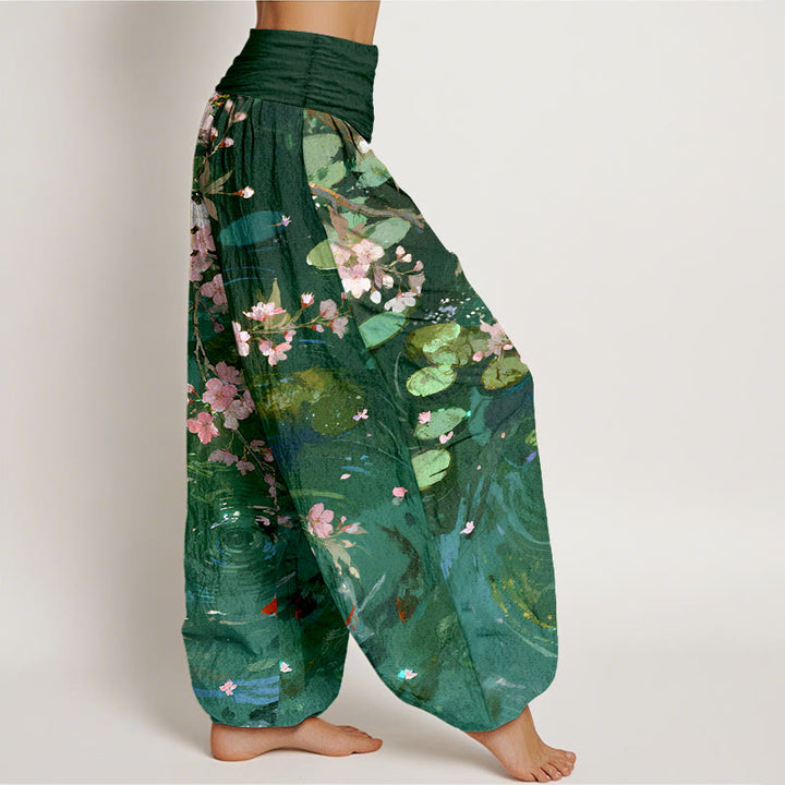 Pantaloni harem da donna con elastico in vita, in puro cotone, con Buddha Stones di ciliegio, pesci koi e foglie di loto - image 2