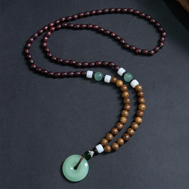 Collana con ciondolo Buddha Stones Wenge Wood Peace Buckle Balance Tranquility - image 1