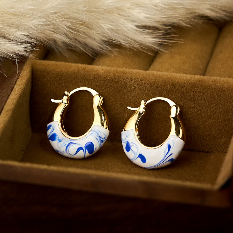 Orecchini a forma di U Buddha Stones placcate in rame e smalto color oro 18k - image 1