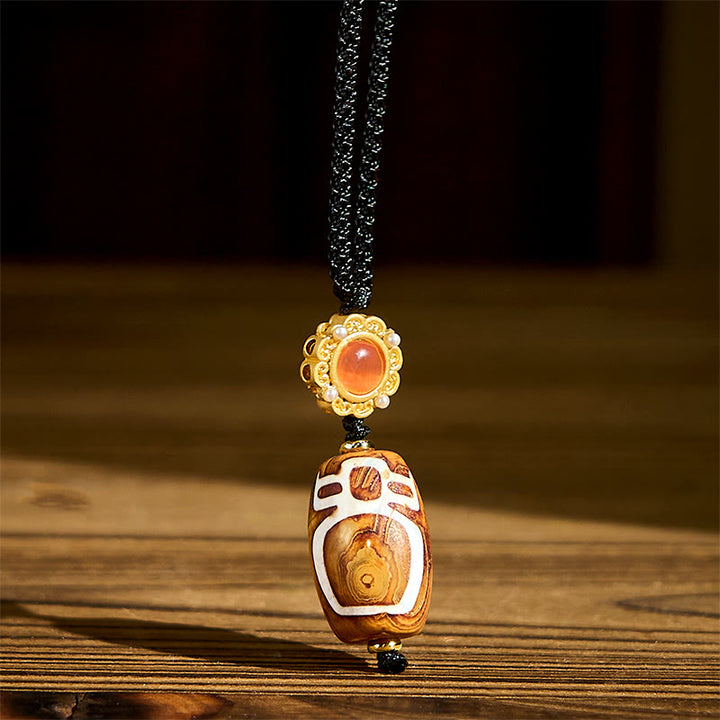 Collana con ciondolo di benedizione in perline Dzi a nove occhi intagliate in agata Buddha Stones raffigurante il Dio della ricchezza - Agata - image 0