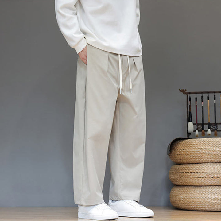 Pantaloni harem da uomo con tasche e gamba dritta, tinta unita, modello Buddha Stones Fall - image 17