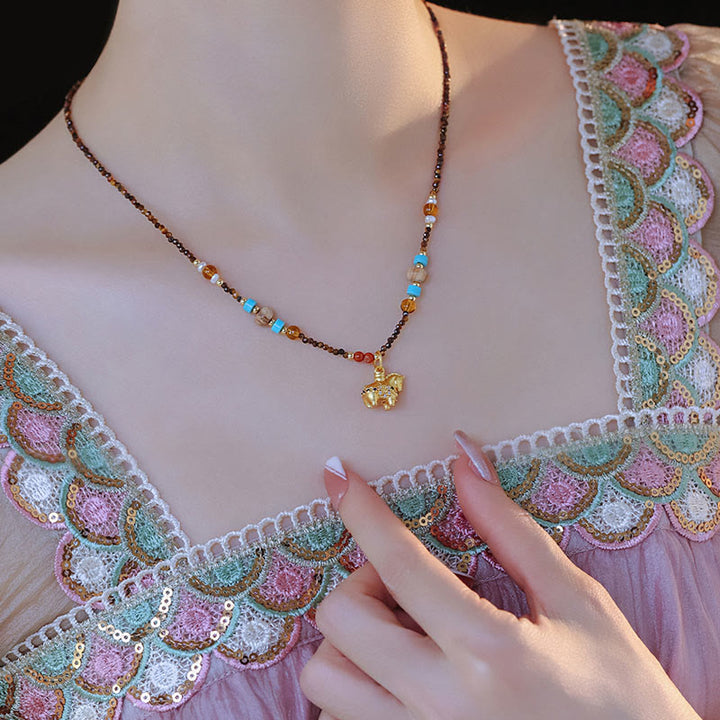 Collana con ciondolo con protezione per l'occhio di tigre Buddha Stones, anno dorato del cavallo - image 4