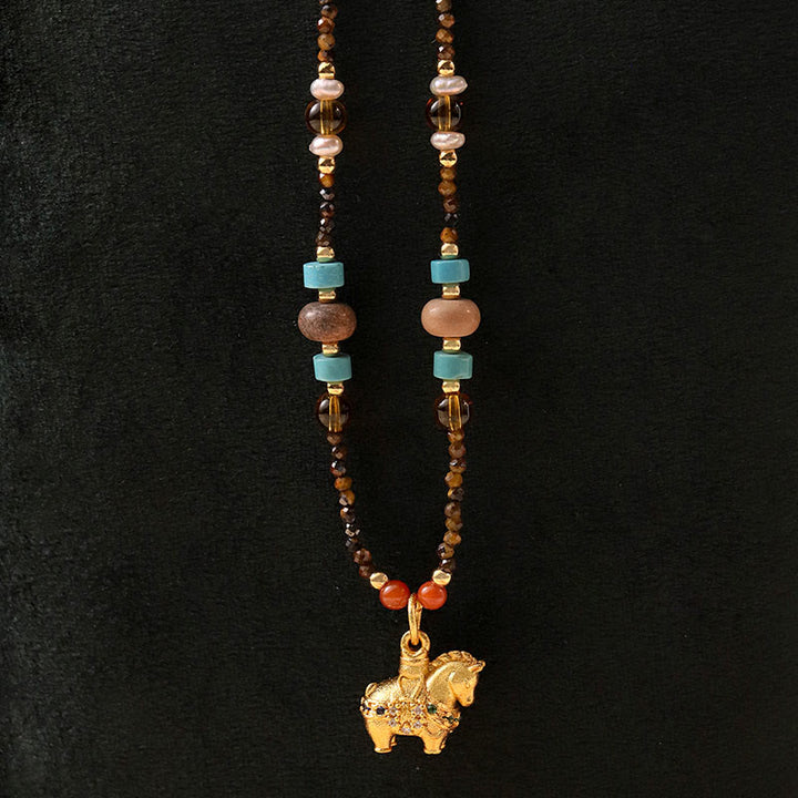 Collana con ciondolo con protezione per l'occhio di tigre Buddha Stones, anno dorato del cavallo - Occhio di tigre - image 0
