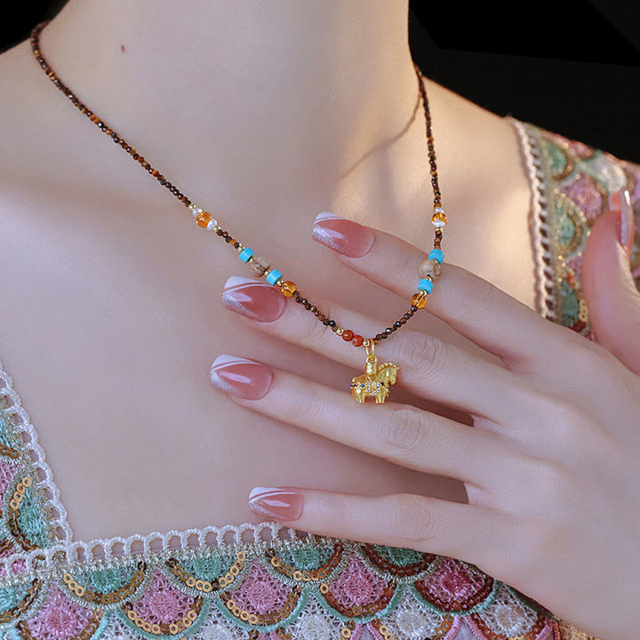 Collana con ciondolo con protezione per l'occhio di tigre Buddha Stones, anno dorato del cavallo - image 10