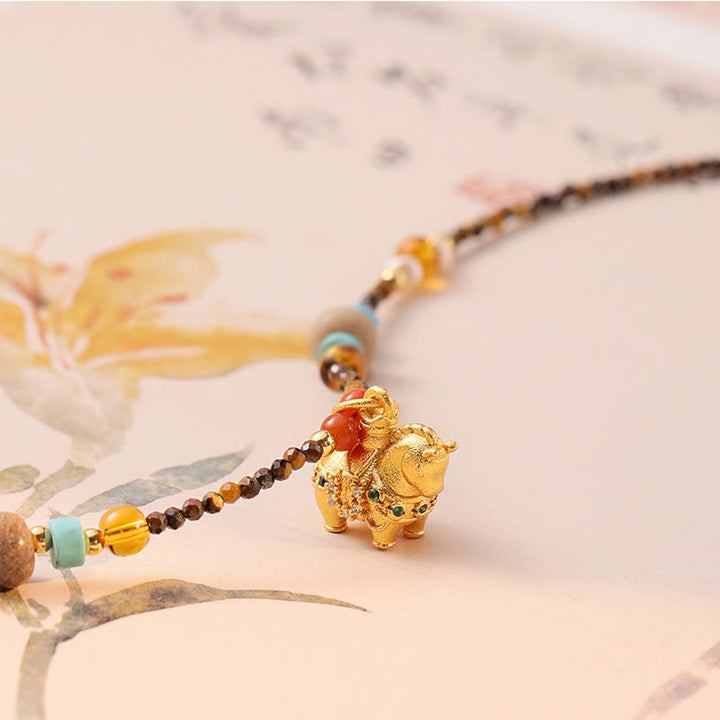 Collana con ciondolo con protezione per l'occhio di tigre Buddha Stones, anno dorato del cavallo - image 2