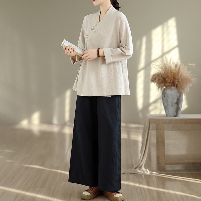 Completo da donna con motivo Buddha Stones, composto da maglietta a maniche lunghe con scollo a V e pantaloni a gamba larga, ideale per la meditazione zen. - image 1
