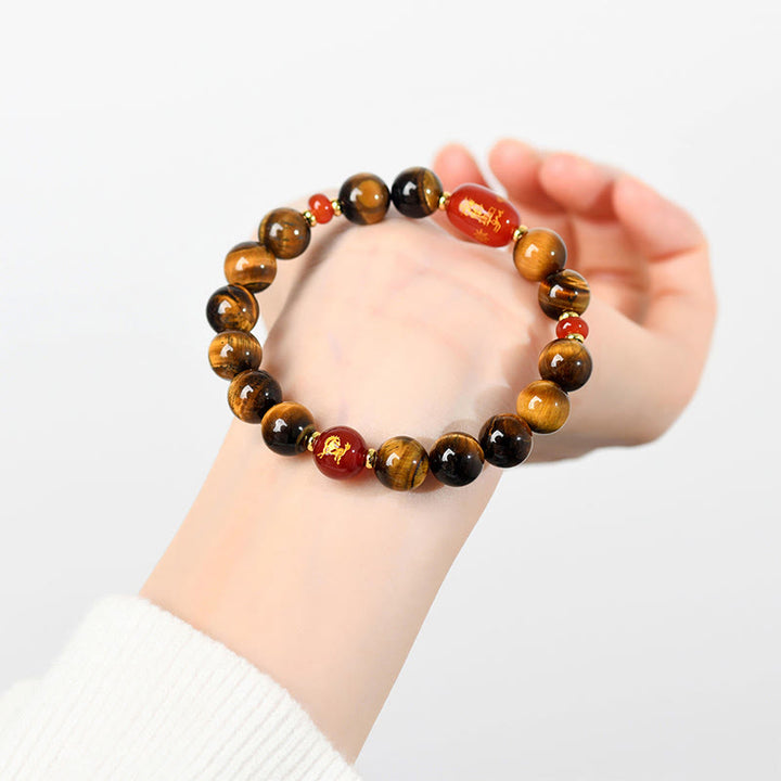 Braccialetto di protezione in agata rossa naturale con occhio di tigre e 12 Buddha Stones - image 14