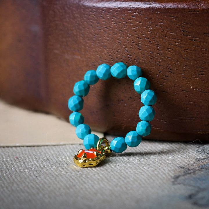 Anello elastico con perline sfaccettate in turchese ultrafine da 4 mm, motivo Buddha Stones - image 2