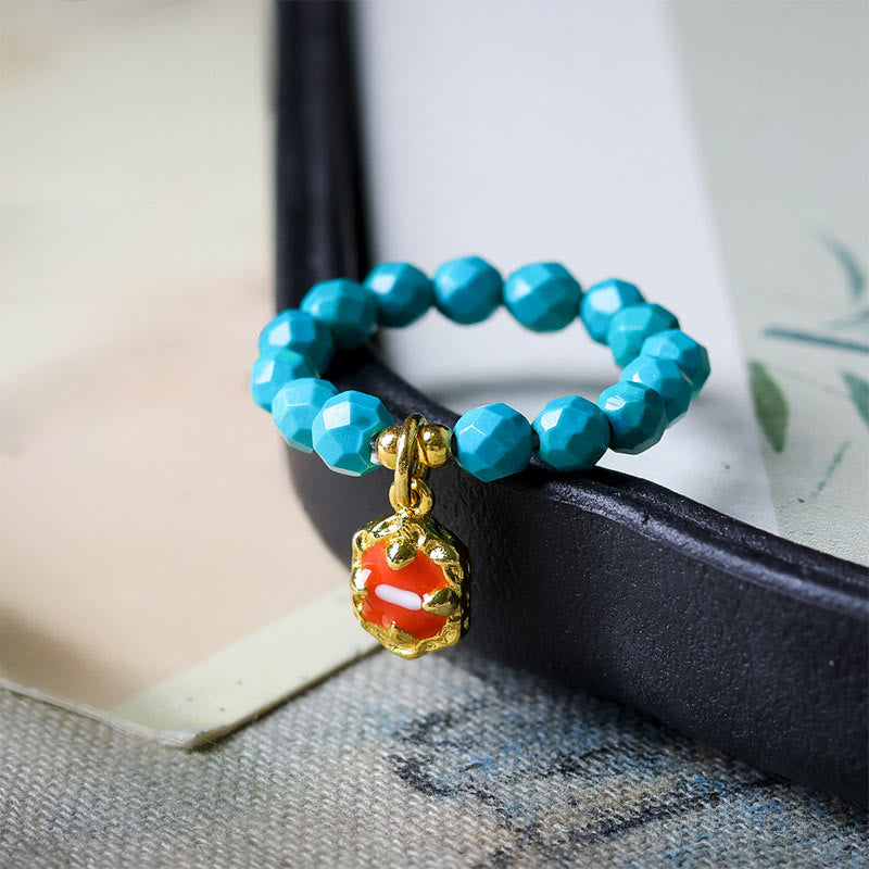 Anello elastico con perline sfaccettate in turchese ultrafine da 4 mm, motivo Buddha Stones - image 1