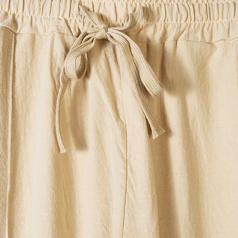 Pantaloni da uomo in cotone con tasche e bottoni laterali in tinta unita con Buddha Stones - image 1