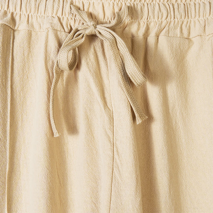 Pantaloni da uomo in cotone con tasche e bottoni laterali in tinta unita con Buddha Stones - image 1