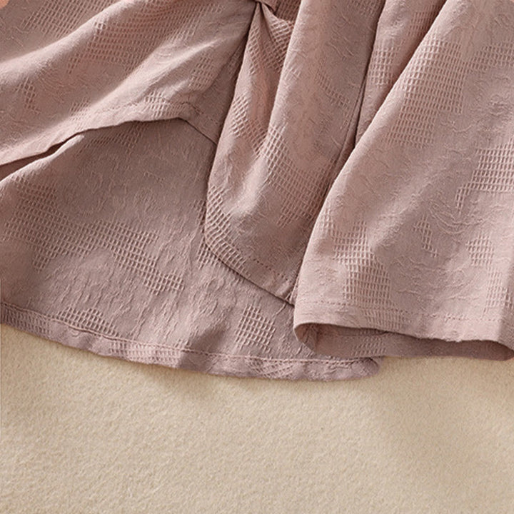 Camicia da donna a maniche lunghe con orlo irregolare e pieghe, stampa jacquard con motivo Buddha Stones. - image 22