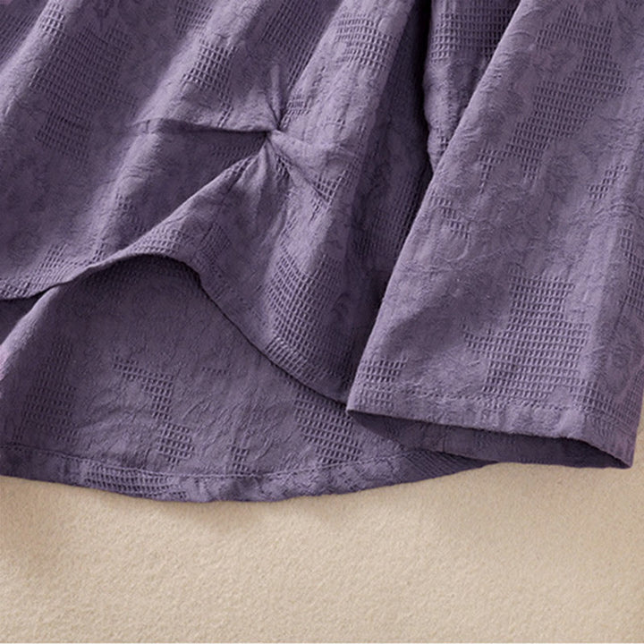 Camicia da donna a maniche lunghe con orlo irregolare e pieghe, stampa jacquard con motivo Buddha Stones. - image 6