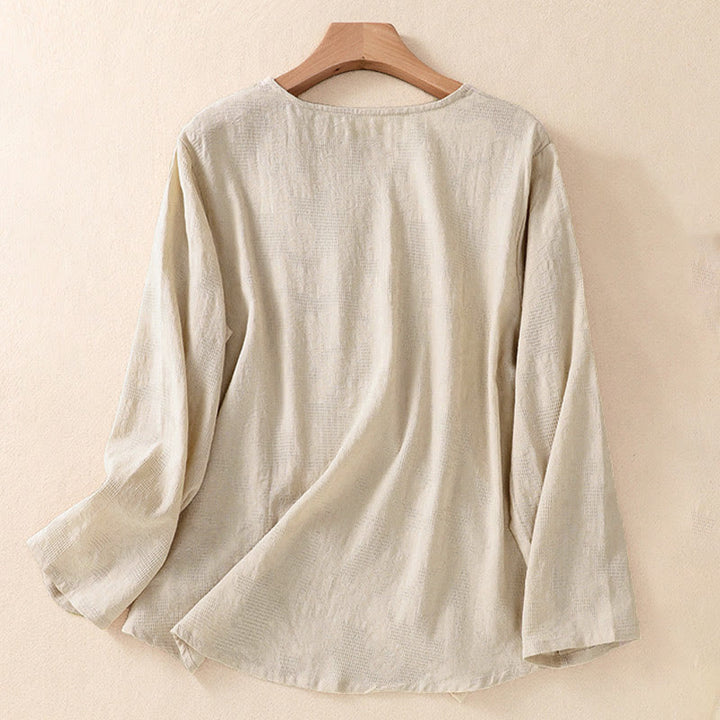Camicia da donna a maniche lunghe con orlo irregolare e pieghe, stampa jacquard con motivo Buddha Stones. - image 26