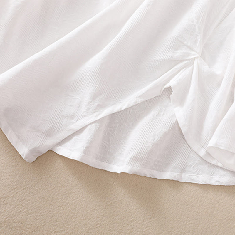 Camicia da donna a maniche lunghe con orlo irregolare e pieghe, stampa jacquard con motivo Buddha Stones. - image 15