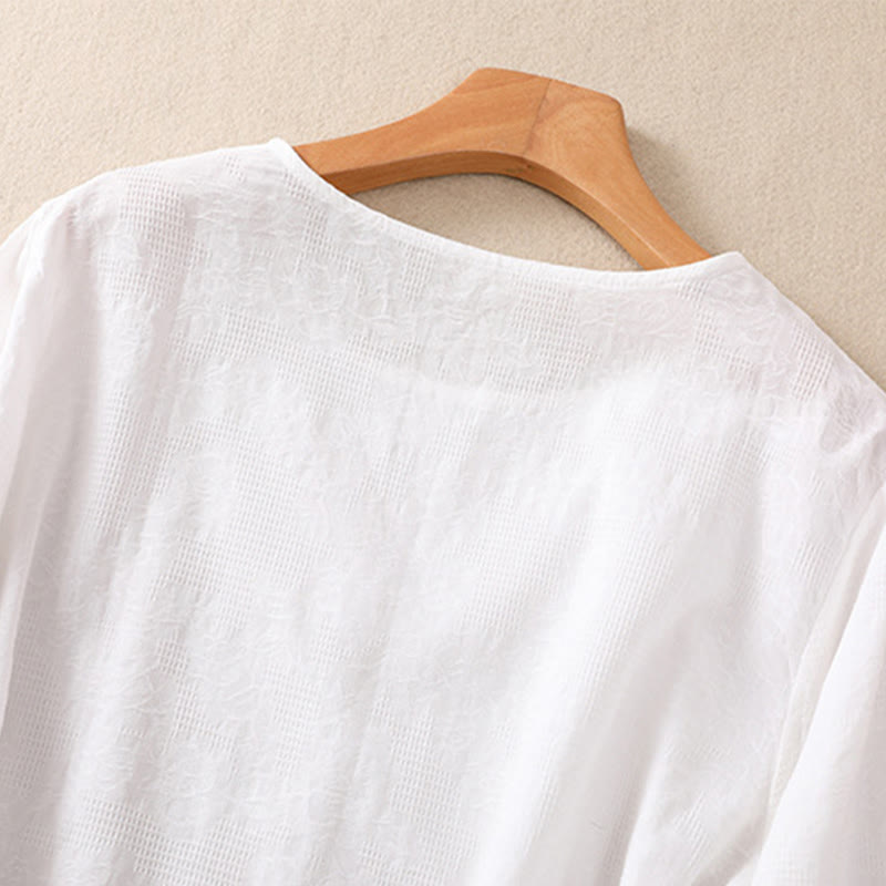 Camicia da donna a maniche lunghe con orlo irregolare e pieghe, stampa jacquard con motivo Buddha Stones. - image 11