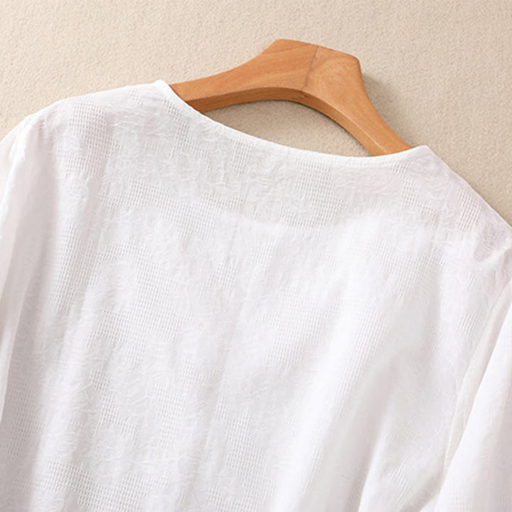 Camicia da donna a maniche lunghe con orlo irregolare e pieghe, stampa jacquard con motivo Buddha Stones. - image 11