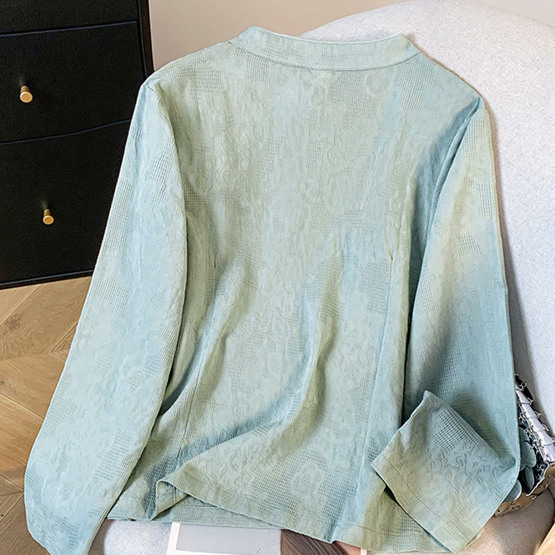 Camicia da donna a maniche lunghe con colletto alla coreana e bottoni a rana cinese, in jacquard con motivo Buddha Stones Commute. - image 1