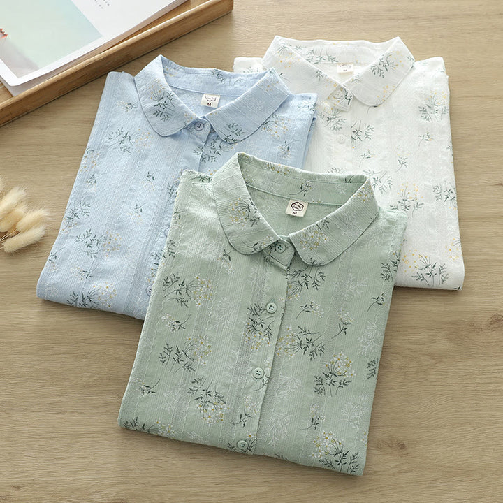 Camicia da donna in cotone a maniche lunghe con bottoni, motivo Buddha Stones Fall, fiori bianchi e gialli, foglie verdi - image 0