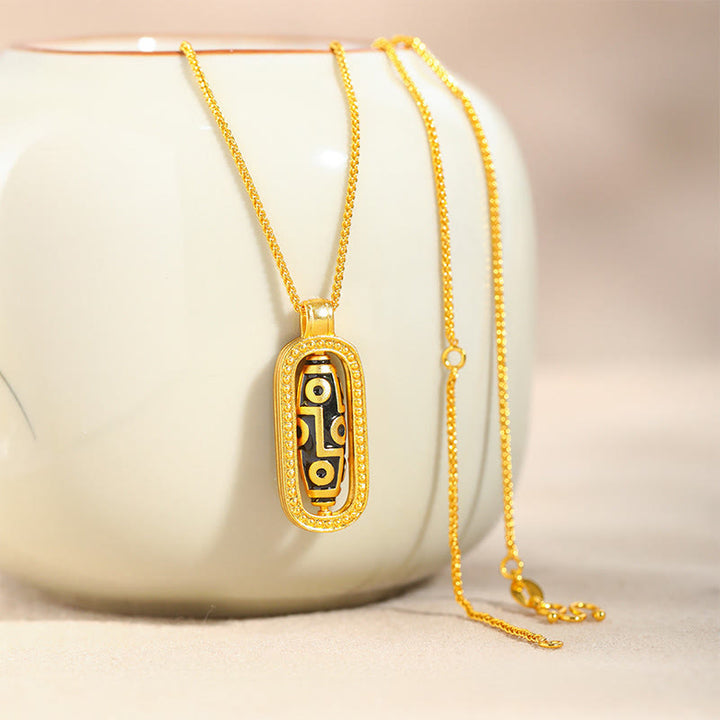 Collana con ciondolo in rame con motivo di buon auspicio e equilibrio, perline Dzi a nove occhi Buddha Stones - image 2