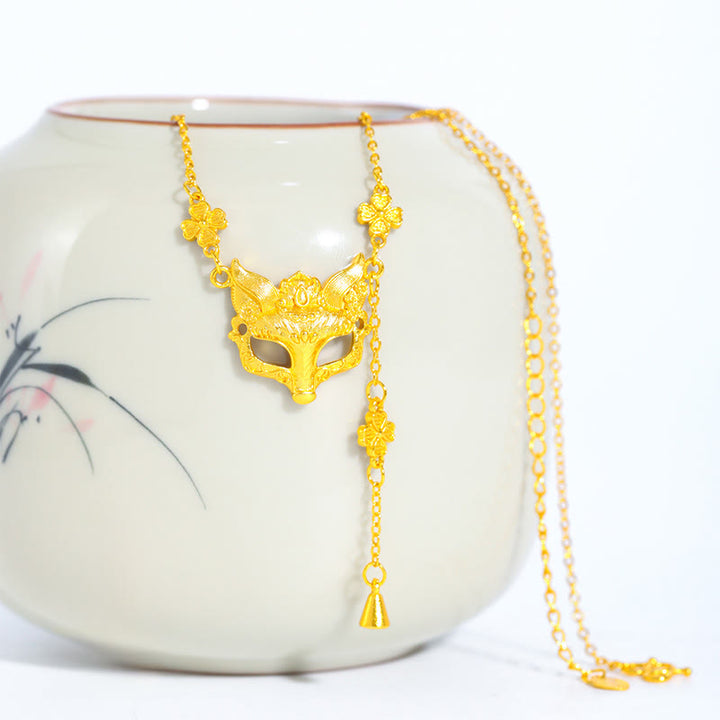 Collana con ciondolo in rame con nappa e disegno a forma di fiore di volpe dorata in pietra di Buddha - image 0