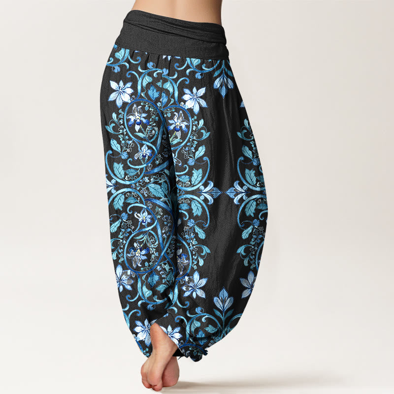 Pantaloni harem da donna con elastico in vita, in cotone, con motivo simmetrico di fiori e foglie, motivo Buddha Stones - image 1